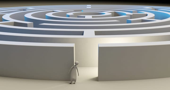 A rendering of an agent in front of a huge maze
